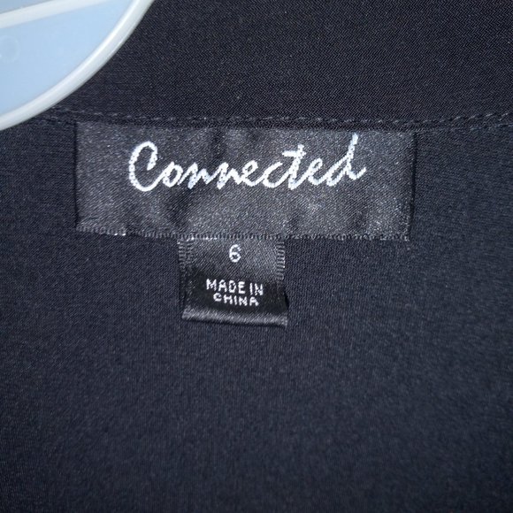 Office style, A Collared Button Top Dress with Animal print bottom. - Picture 4 of 7